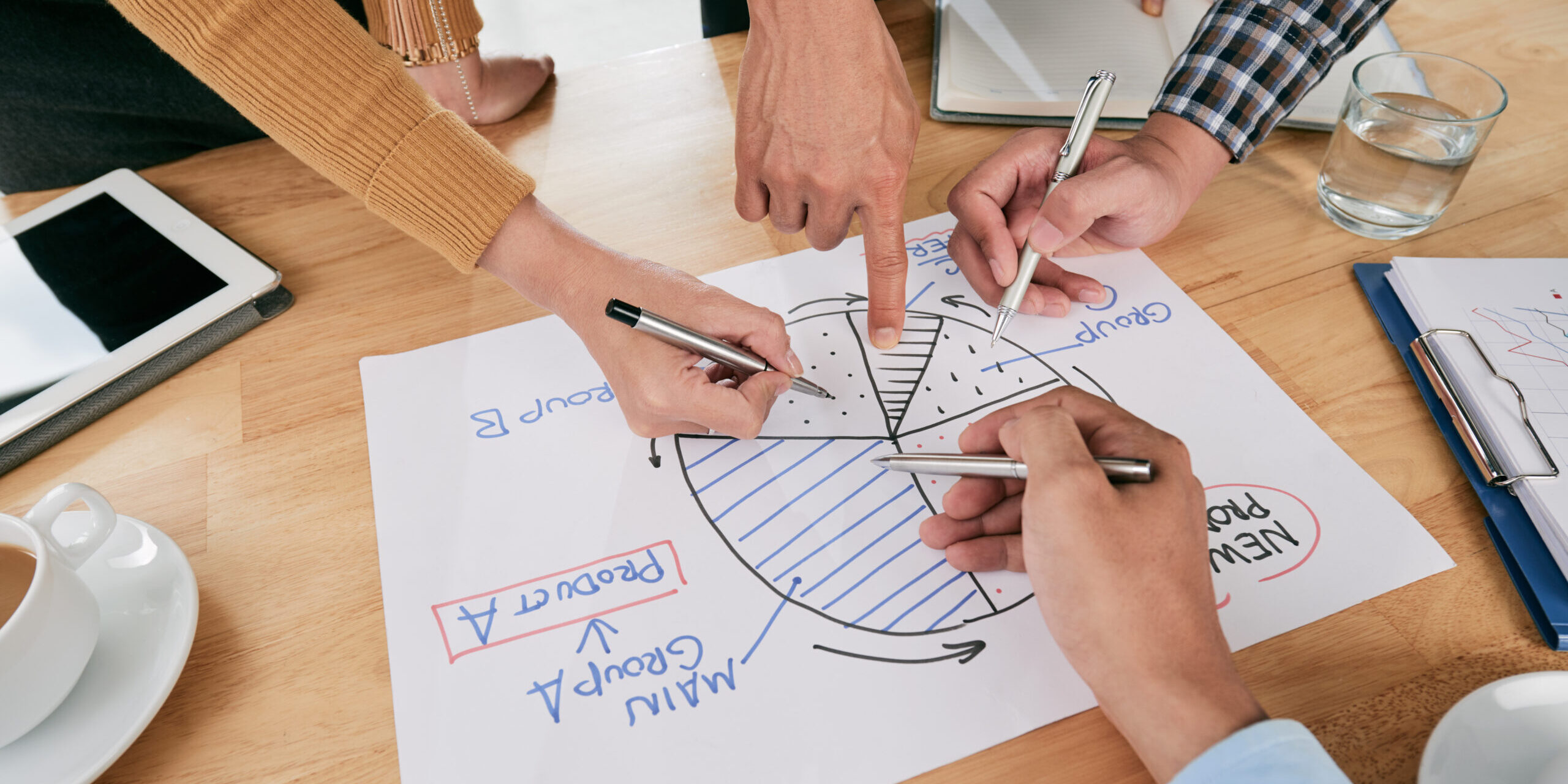 Pointing at financial chart